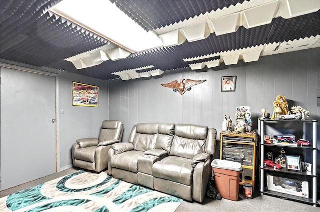 carpeted living room with baseboards