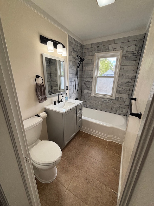 bathroom featuring vanity, toilet, and tub / shower combination