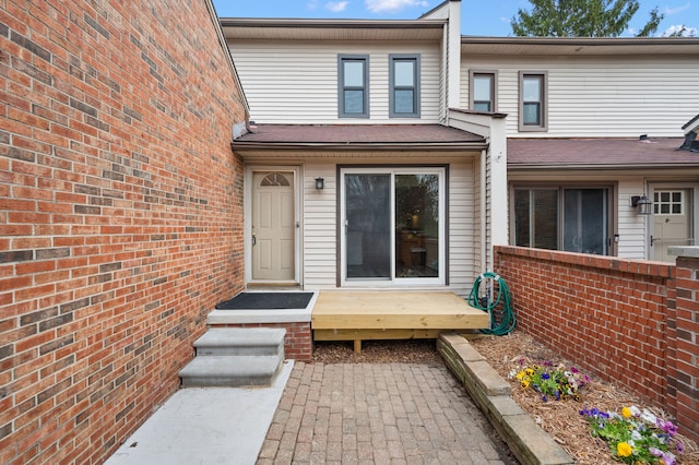 back of house featuring a deck
