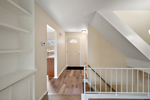 entrance foyer featuring baseboards