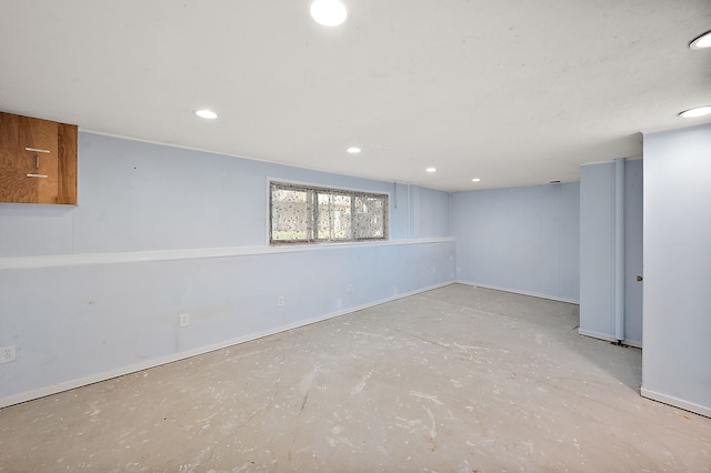 basement featuring recessed lighting and baseboards