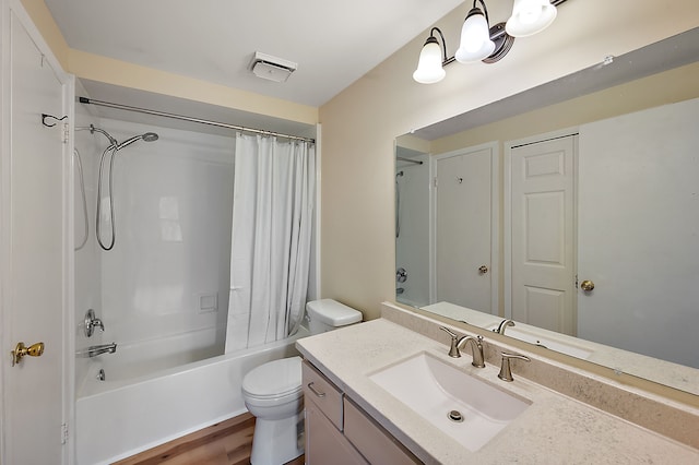 bathroom with toilet, shower / bath combination with curtain, wood finished floors, and vanity