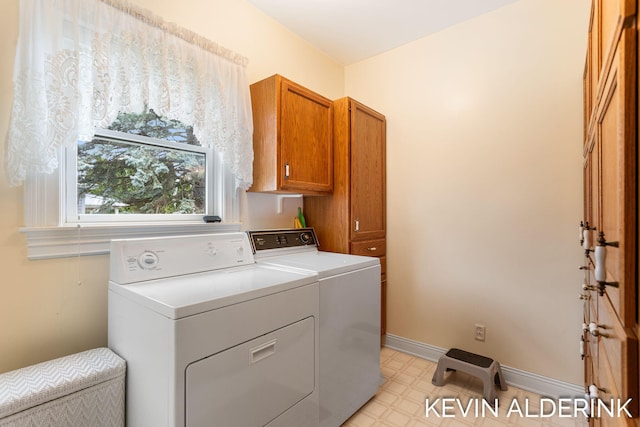 201 N Woodworth St, Corunna, MI 48817 - washroom featuring cabinet space, washer and dryer, and light floors