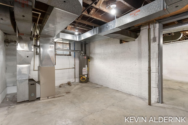 201 N Woodworth St, Corunna, MI 48817 - unfinished below grade area with water heater and heating unit