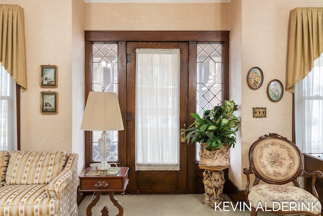 201 N Woodworth St, Corunna, MI 48817 - carpeted foyer entrance featuring wallpapered walls