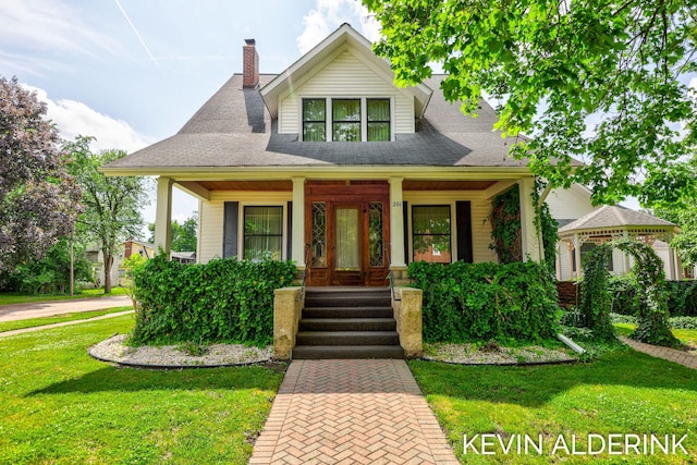 201 N Woodworth St, Corunna, MI 48817 - view of front of home with a front yard, covered porch, a gazebo, and a chimney