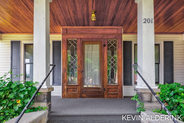 201 N Woodworth St, Corunna, MI 48817 - property entrance with a porch
