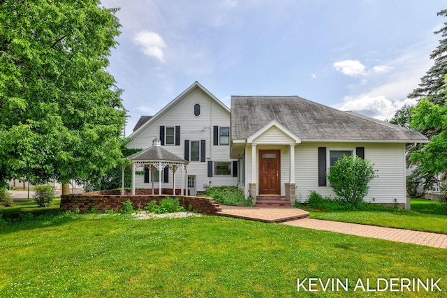201 N Woodworth St, Corunna, MI 48817 - view of front of house with a gazebo, a front lawn, and roof with shingles