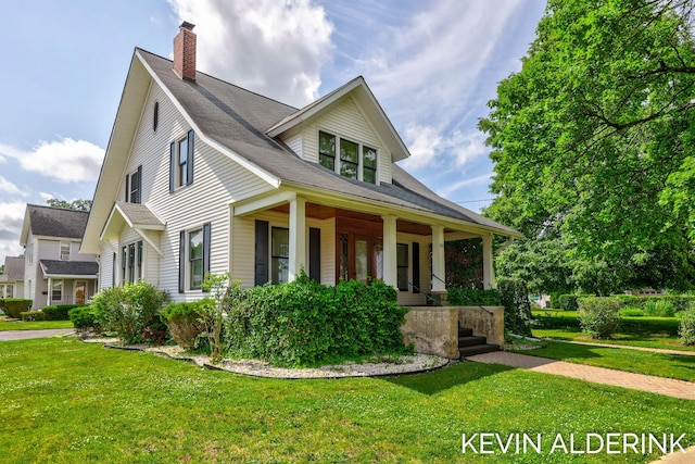 201 N Woodworth St, Corunna, MI 48817 - view of front of property featuring covered porch, a chimney, and a front yard