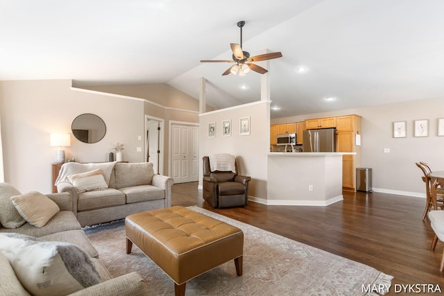 living room featuring dark wood finished floors, a ceiling fan, baseboards, recessed lighting, and vaulted ceiling