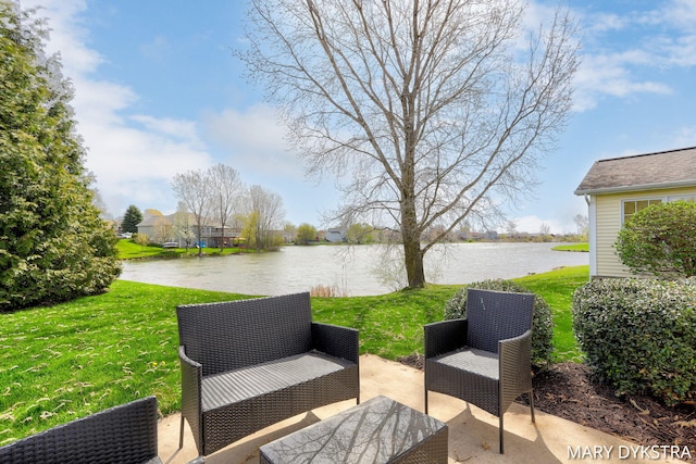 view of patio with a water view