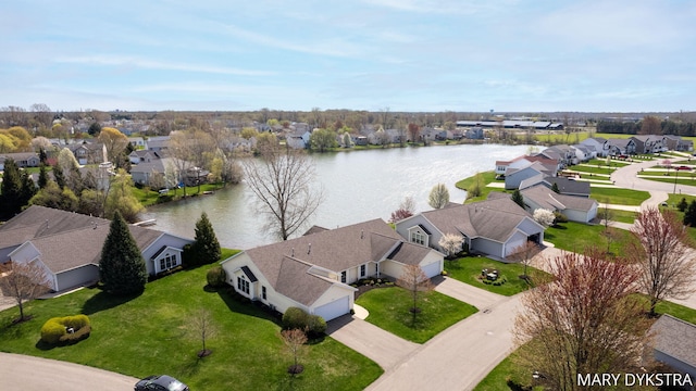 bird's eye view featuring a water view and a residential view