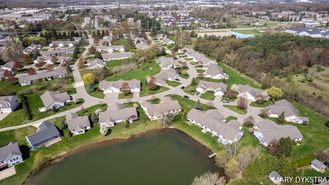 aerial view featuring a residential view and a water view