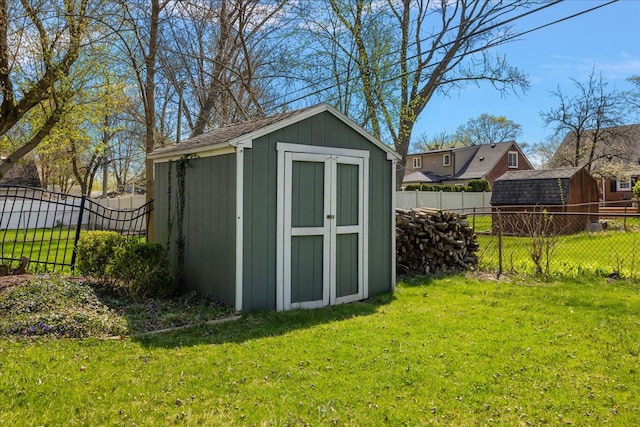 view of shed featuring a fenced backyard