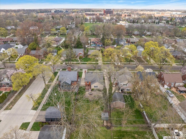 birds eye view of property with a residential view