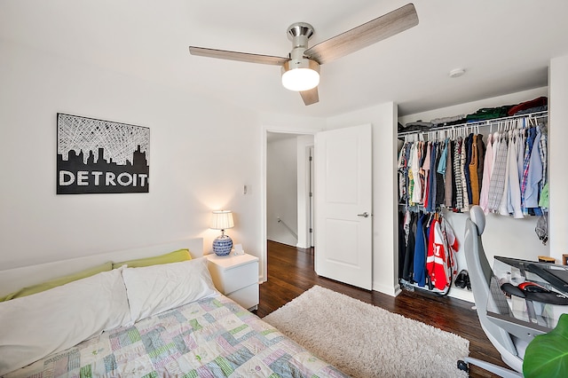 bedroom featuring a closet, a ceiling fan, and wood finished floors