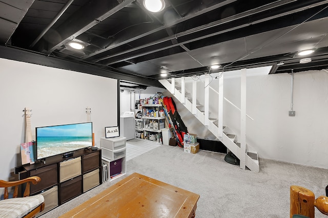 finished below grade area with carpet floors and stairs