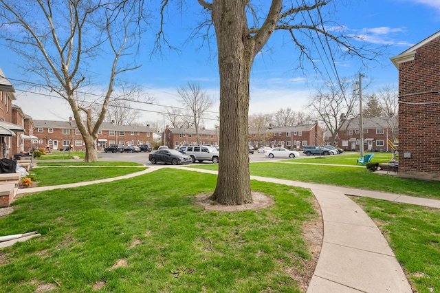 view of yard featuring a residential view