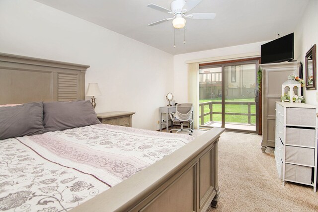 bedroom with access to outside, ceiling fan, and light carpet