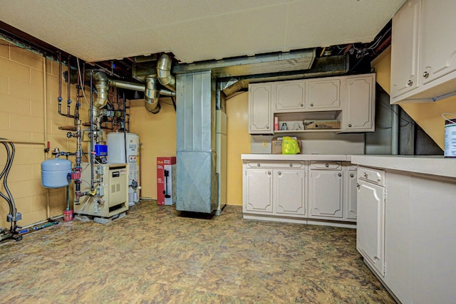 interior space with a heating unit and gas water heater