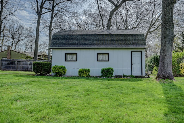 view of outdoor structure with fence