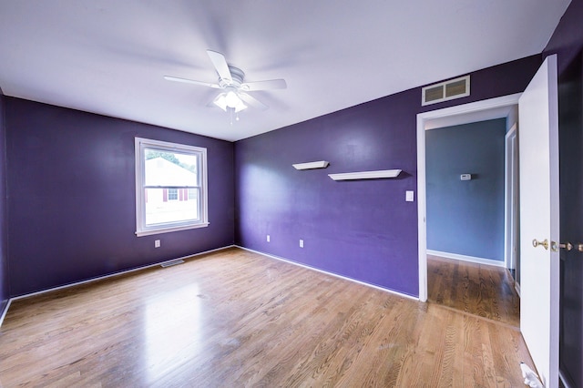 3067 Oakridge, Lake Orion, MI 48360 - unfurnished room featuring ceiling fan, wood finished floors, and baseboards