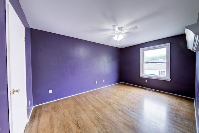 3067 Oakridge, Lake Orion, MI 48360 - empty room with ceiling fan, wood finished floors, and baseboards