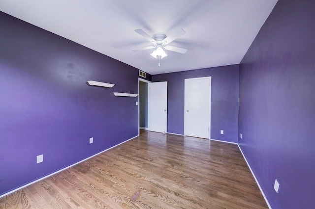 3067 Oakridge, Lake Orion, MI 48360 - unfurnished bedroom with wood finished floors, baseboards, and a ceiling fan