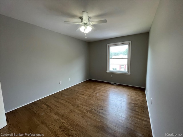 3067 Oakridge, Lake Orion, MI 48360 - unfurnished room with ceiling fan and dark wood finished floors