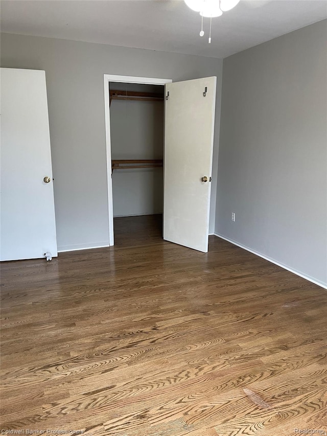 3067 Oakridge, Lake Orion, MI 48360 - unfurnished bedroom featuring a closet and wood finished floors