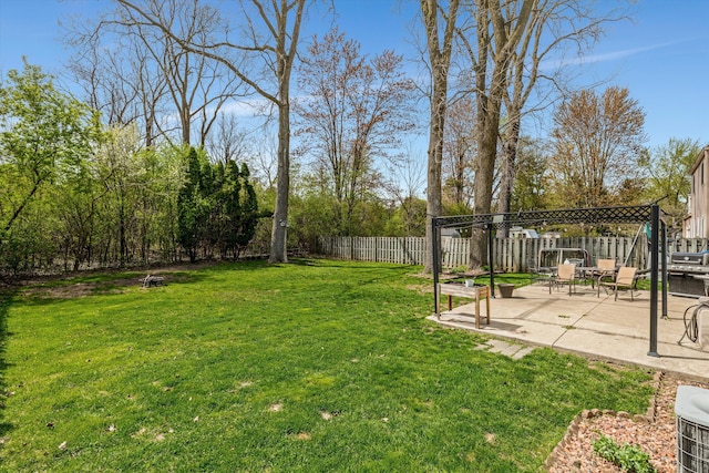 view of yard featuring a fenced backyard and a patio area