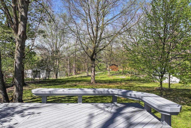 wooden deck with a yard