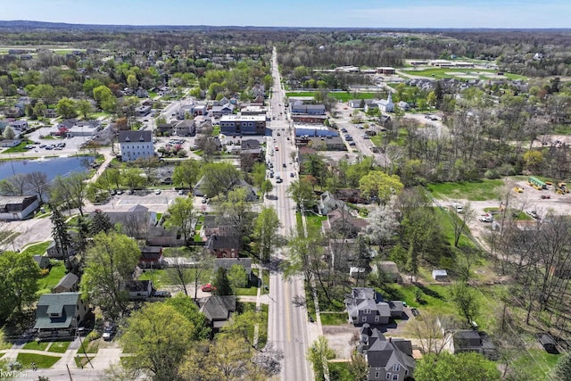 birds eye view of property with a residential view and a water view