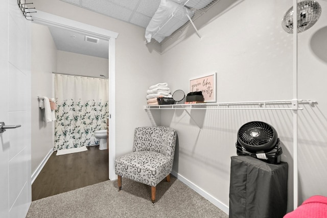 spacious closet with wood finished floors and visible vents