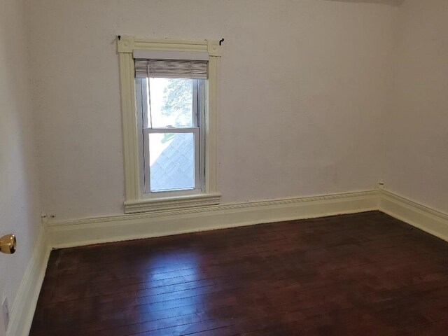 429 S Arnold, Mount Pleasant, MI 48858 - empty room with wood-type flooring and baseboards