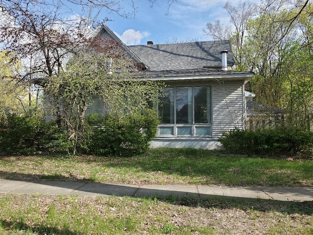 429 S Arnold, Mount Pleasant, MI 48858 - view of home's exterior with a shingled roof