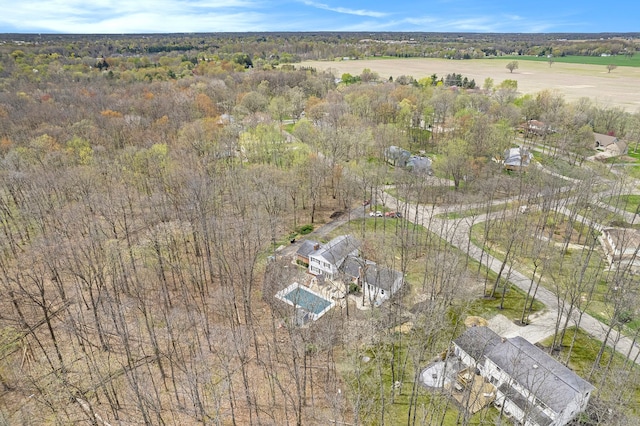 bird's eye view with a forest view