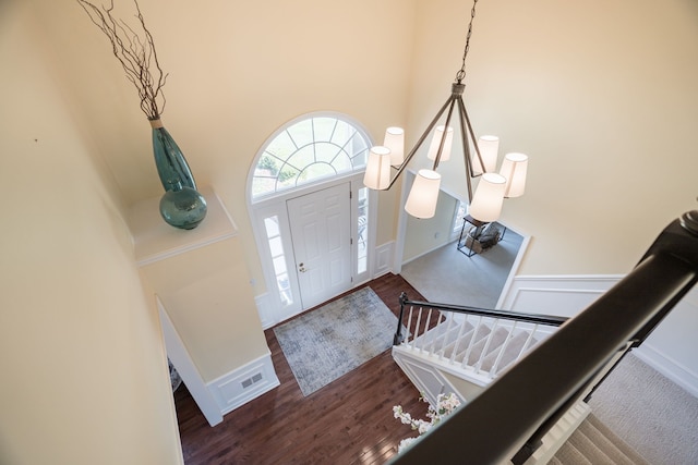 1699 Devonwood Dr, Rochester Hills, MI 48306 - entryway featuring a high ceiling, wood finished floors, and visible vents