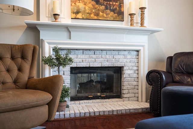 1699 Devonwood Dr, Rochester Hills, MI 48306 - details with a brick fireplace and wood finished floors