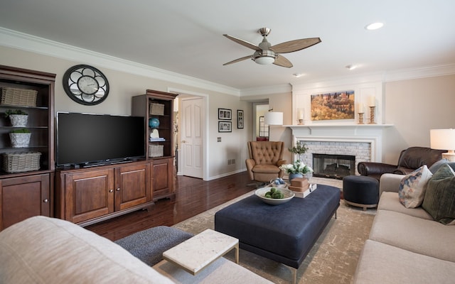1699 Devonwood Dr, Rochester Hills, MI 48306 - living room with ornamental molding, a fireplace, baseboards, ceiling fan, and dark wood-type flooring
