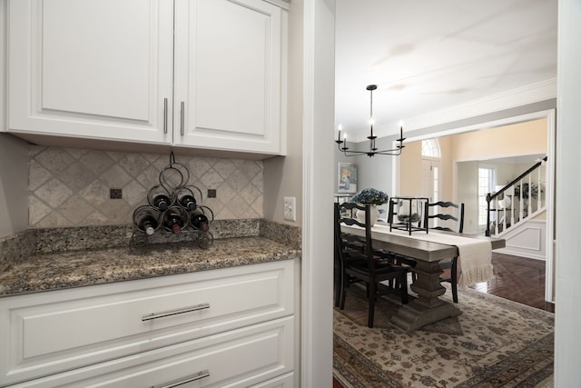 1699 Devonwood Dr, Rochester Hills, MI 48306 - interior space featuring ornamental molding, a notable chandelier, and stairway