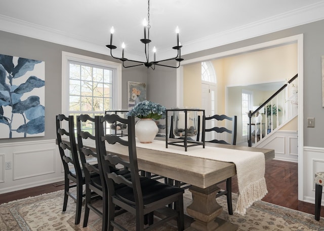 1699 Devonwood Dr, Rochester Hills, MI 48306 - dining space with a chandelier, dark wood-style floors, ornamental molding, and a decorative wall