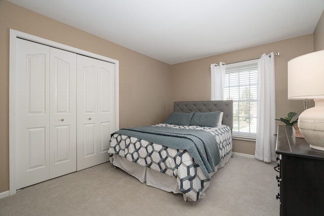 1699 Devonwood Dr, Rochester Hills, MI 48306 - bedroom with a closet, baseboards, and light carpet
