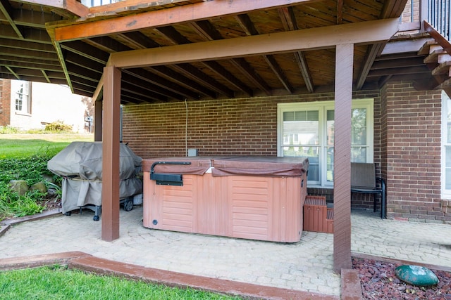 1699 Devonwood Dr, Rochester Hills, MI 48306 - view of patio / terrace featuring a hot tub and grilling area