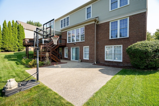 1699 Devonwood Dr, Rochester Hills, MI 48306 - back of property with brick siding, a wooden deck, stairway, a patio area, and a lawn