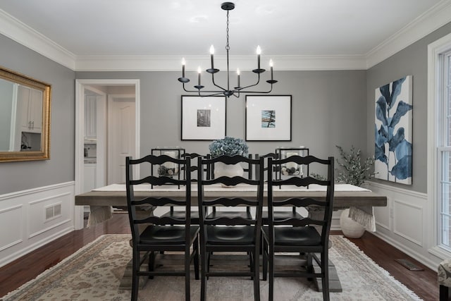 1699 Devonwood Dr, Rochester Hills, MI 48306 - dining room with visible vents, ornamental molding, an inviting chandelier, and dark wood-type flooring