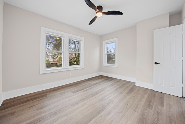 15866 Woodingham Dr, Detroit, MI 48238 - spare room with ceiling fan, baseboards, and light wood-style floors
