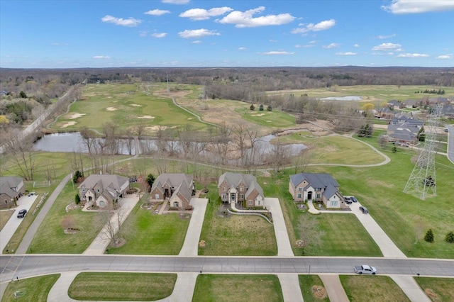 bird's eye view featuring a water view, a residential view, and golf course view