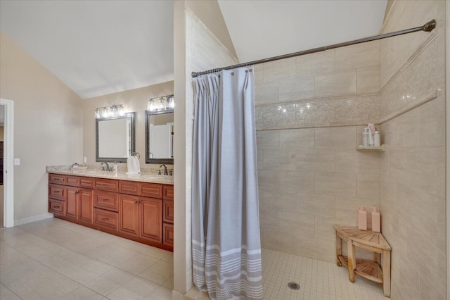 full bath with tile patterned floors, a tile shower, and lofted ceiling