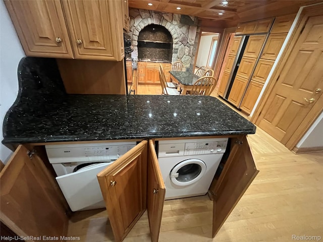 3015 E Village Ln, Port Huron, MI 48060 - kitchen featuring washer / clothes dryer, recessed lighting, a peninsula, dark stone countertops, and wall oven